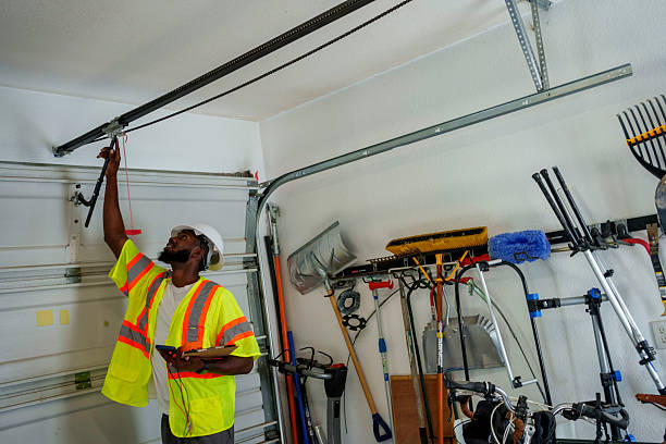 Professional Garage Door technician working in Charles City, IA